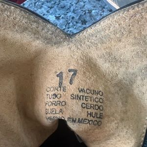 leather cowboy boots are in good condition